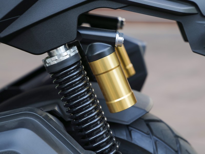 DUAL REAR SUSPENSION AND CENTRE STAND