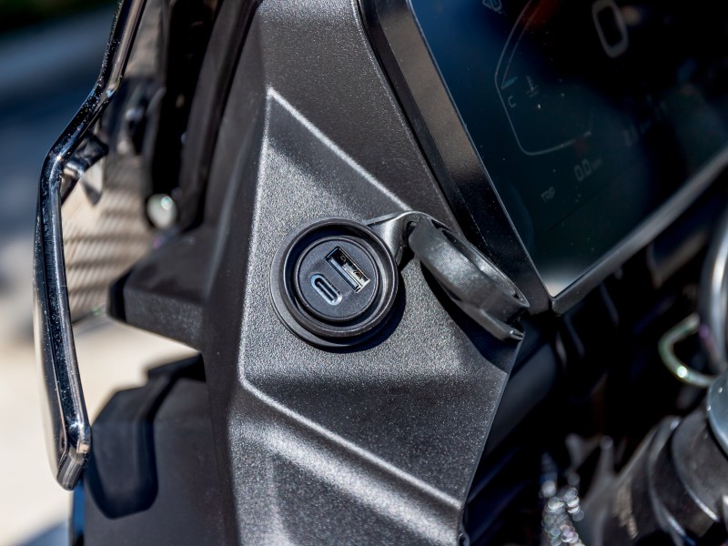 Engine bars, Main stand, Hand guards, two power sockets and adjustable windshield.